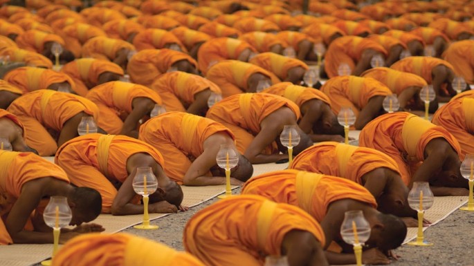 https://evolutionarybusinesspsychologyblog.files.wordpress.com/2023/01/buddhist-prayer-in-thailand-nature-2013.jpeg